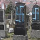 Eighty Jewish graves with swastikas daubed