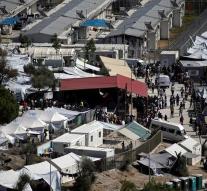 Asylum seekers Lesbos stabbing portion camp fire
