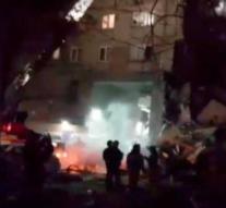 Flat Russia collapses, possibly people under the rubble