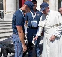 Pope petting dog rescued the girl