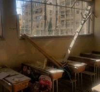 Rebels in Aleppo shelling school