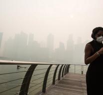 Travelers are stranded in Singapore by ash cloud