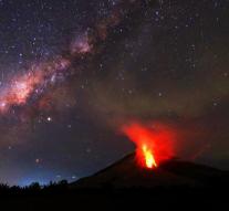 Volcano on Sumatra spits miles high ash