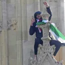 Man Climbs Big Ben with Palestinian Flag
