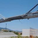 Photo of 'elegant' bridge Genoa shows loose hanging cables