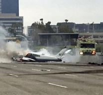 Airplane crash on highway: 2 injured