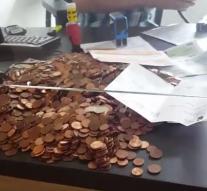 Angry man pays fine with 5100 coins