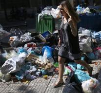 Athens stinks through mountains of garbage on the street