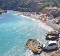 Belgian couple drives rental car from cliff