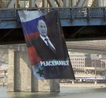 Big banner Putin Manhattan Bridge