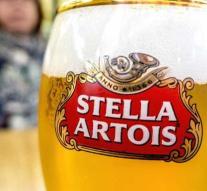 Bottles of Stella Artois back to glass in beer