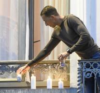 Brother perpetrators Paris lit candles for the dead
