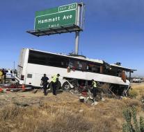 Bus crashes and splits for three quarters