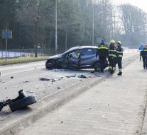 Car with mother and daughter stores several times on the head in Heemstede