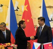 China and Philippines fall into each other's arms