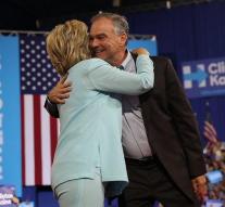 Clinton and Kaine hand in hand to convention