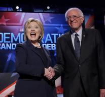 Clinton and Sanders play on the man in debate