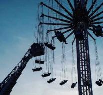 Festival goers stuck in a whirligig