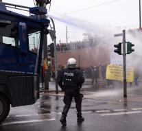 German police use water cannon at protest