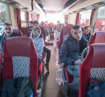 Gift for Merkel: Bus full of refugees