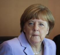 Hacker pointing arrows on Merkel