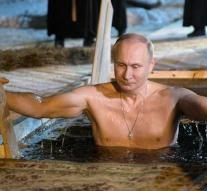 Half-naked Putin takes ice bath