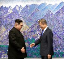 Historically: Korean leaders shake hands