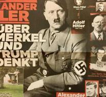 Hitler stands behind Merkel