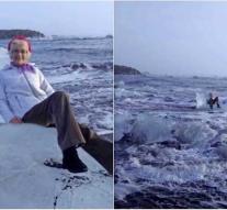 Icelandic ice block breaks off while Grandma poses on it