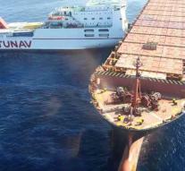 Large oil slick after collision cargo ships