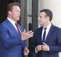 Macron and Schwarzenegger join hands