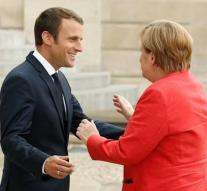 Macron congratulates Merkel