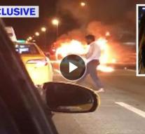 Man leaves passenger cars in a burning car