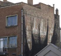 Masturbating woman's hand painted on Brussels wall