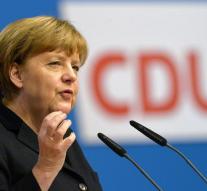 Merkel promises fewer refugees