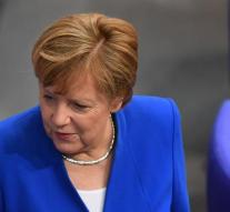 Merkel promises work for everyone in 2025