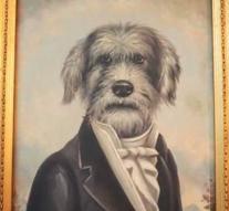 Mysterious thief returns portrait of dog in suit