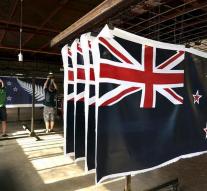 N Zealand holding old flag