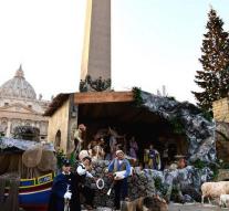Nativity Vatican sign migrants