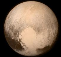 'Pluto its moon turns red'