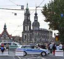 Police cars in Dresden burned