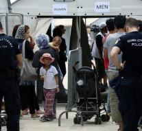 Refugees queue for asylum