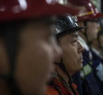 Rescue workers find bodies in my China