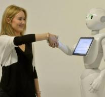 Robots receive hospital patients