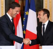 Rutte and Macron man British to speed