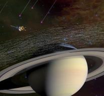 Satellite capture stardust at Saturn