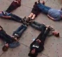 Students form swastika on the floor