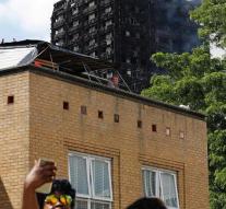 Survivors flat fire London raging on disaster tourists