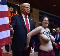 Topless woman 'Trump' grabs you by the balls