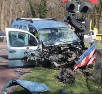 Train collides with car